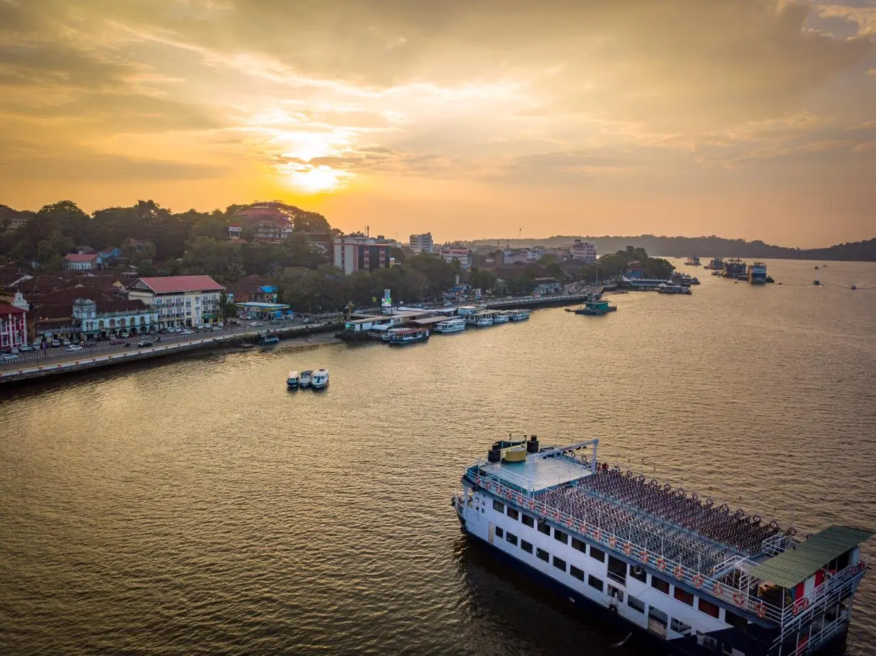 Day 1 Arrival in Goa | Cruise through the azure waters of Mandovi River as the sun sets over the horizon